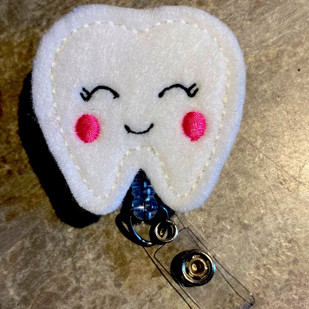 Happy Tooth Badge Reel